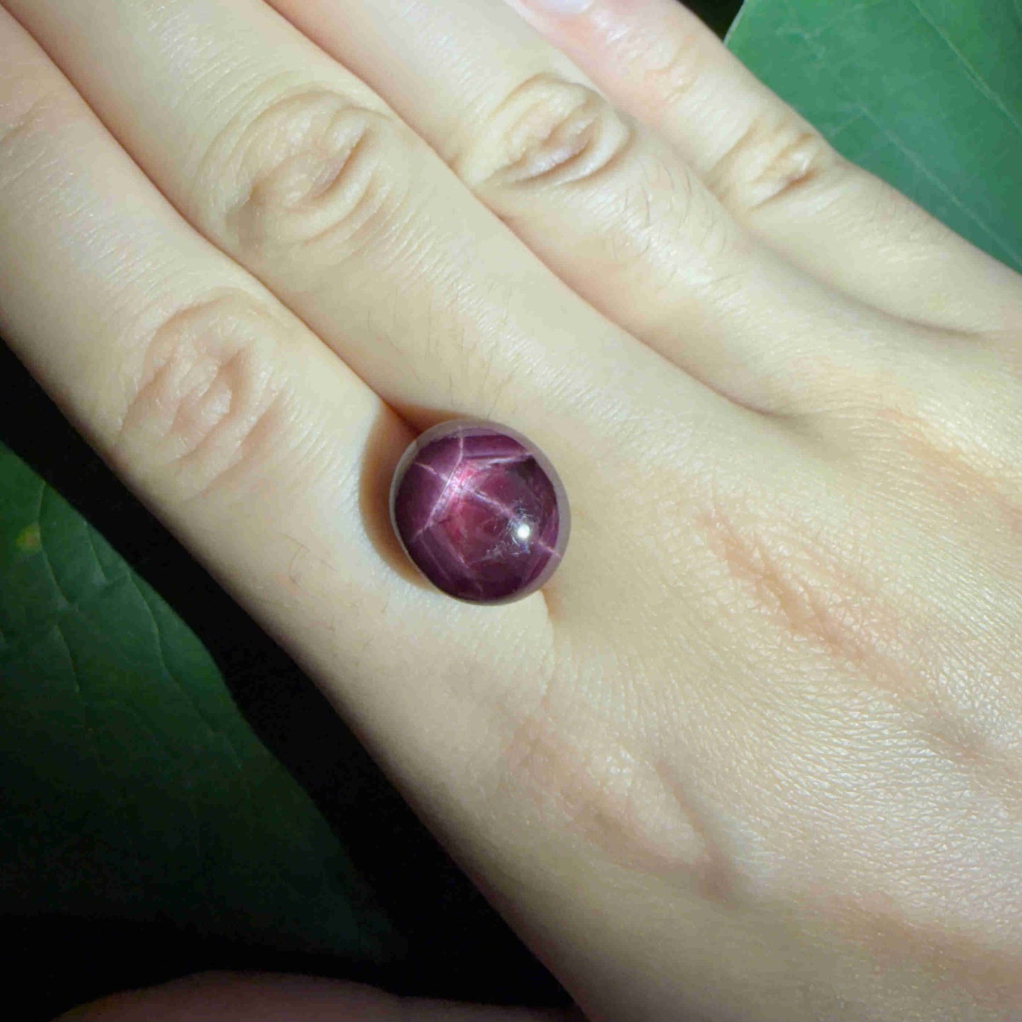 17.3 ct natural Pink-Red Star Ruby cabochon from Mozambique with soft star effect and polished dome.