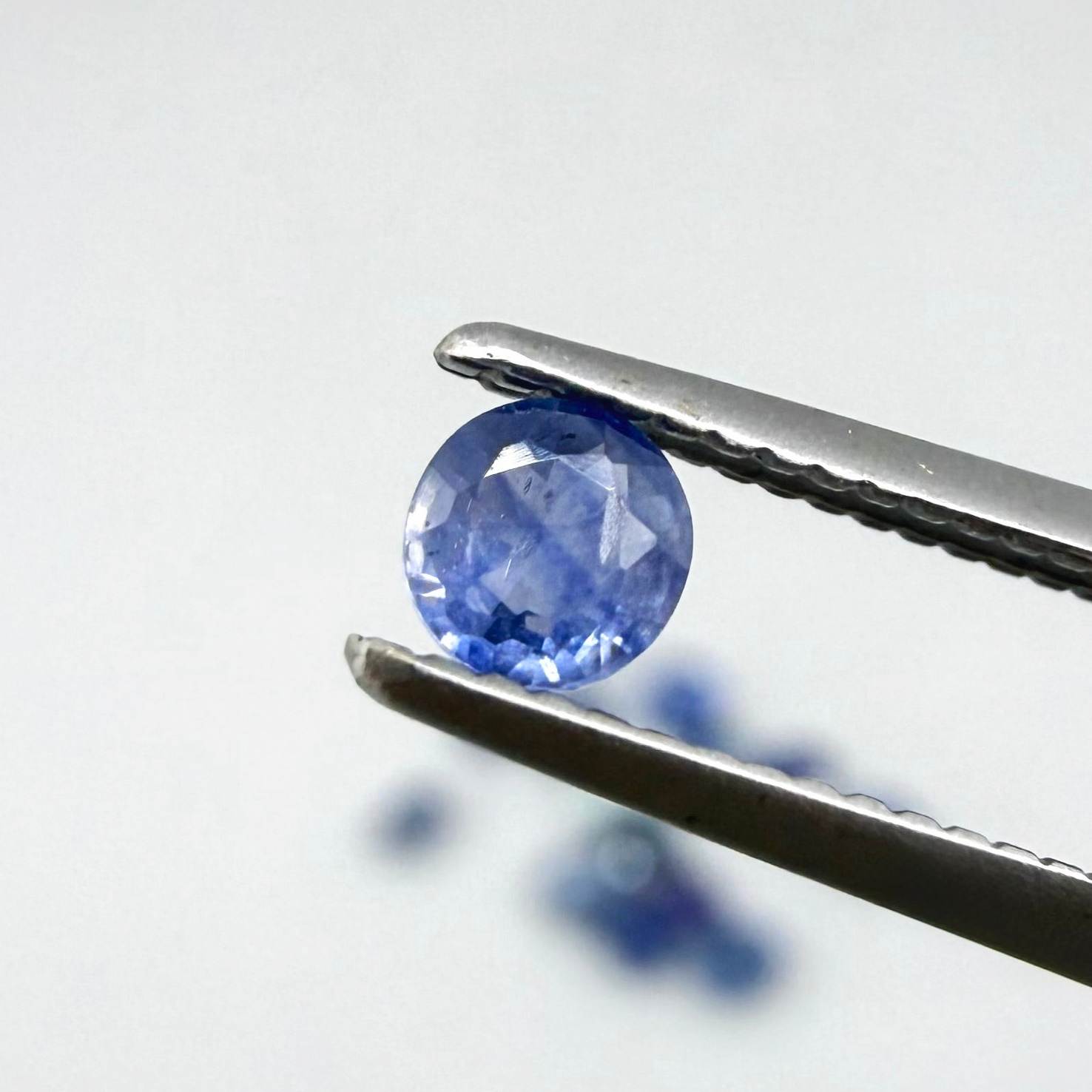 2.8 ct natural sapphire lot from Bangkaja with blue, green and purplish hues, round cut stones.