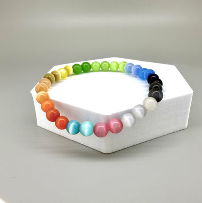 Cat’s Eye multicolor beaded bracelet, 18cm, natural gemstone beads with shimmering light effect on elastic stretch band.