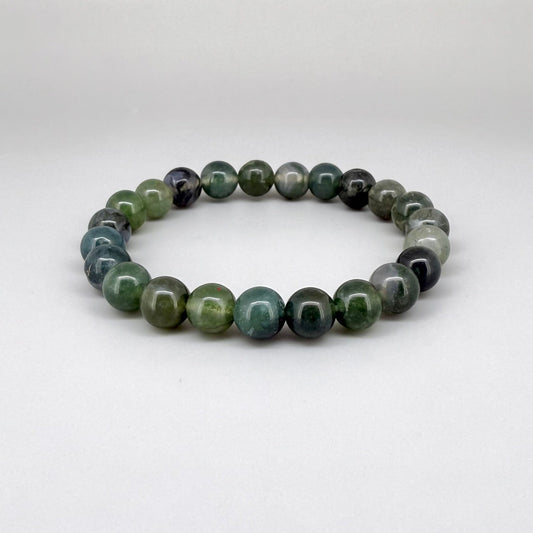Moss agate beaded bracelet, 18cm, natural green and white gemstone beads with moss-like patterns on elastic stretch band.