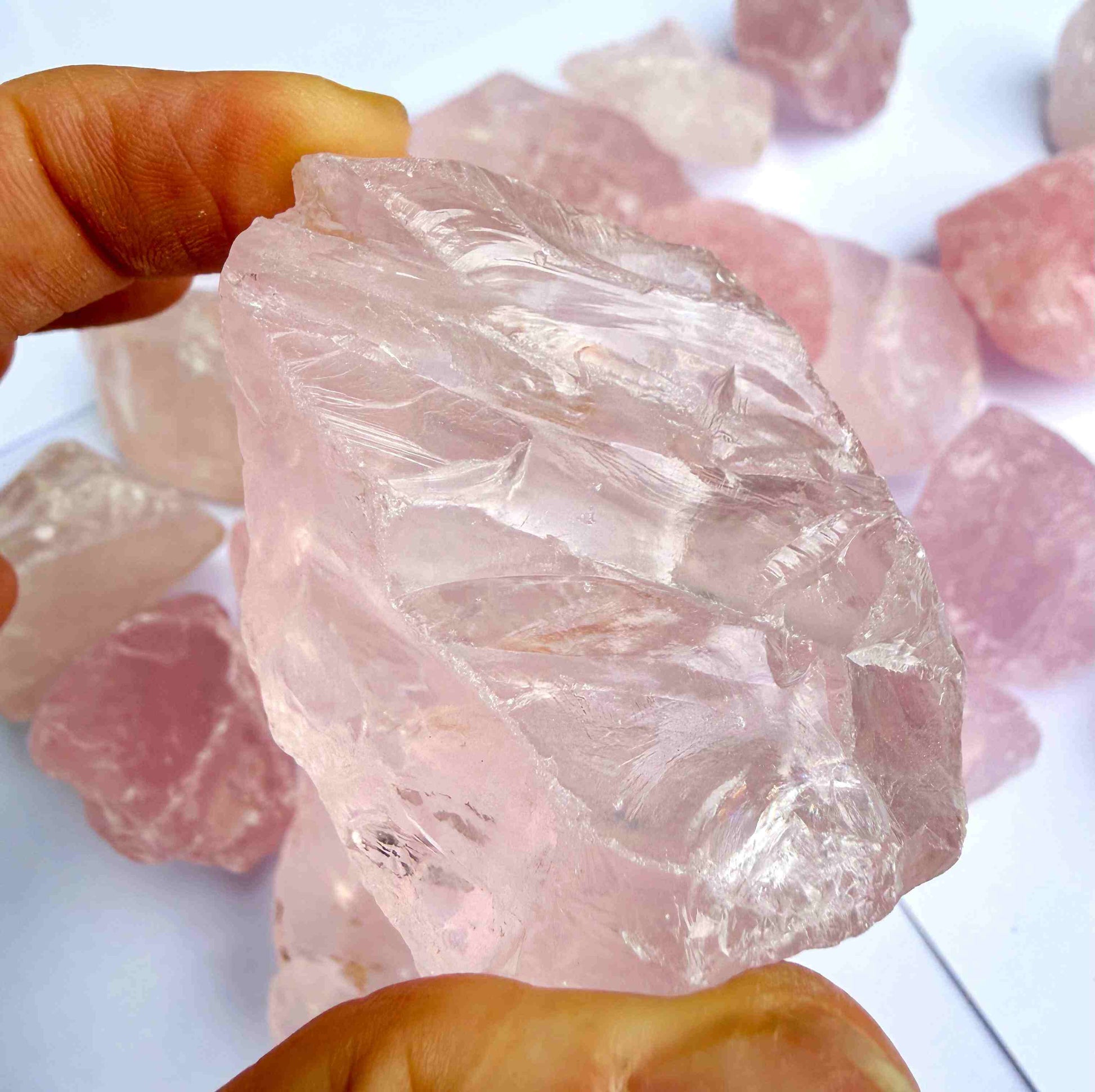 Natural rose quartz rough stones, untreated pink quartz in raw form for lapidary and jewelry projects