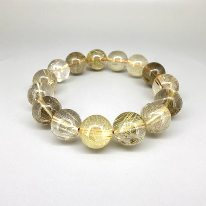 Rutilated quartz beaded bracelet, 18cm, natural gemstone beads with golden rutile threads on elastic stretch band