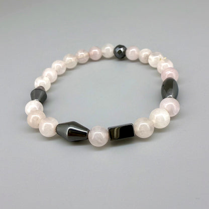 Rose quartz and hematite beaded bracelet, 18cm, soft pink gemstone beads with metallic hematite spacers on elastic stretch band.