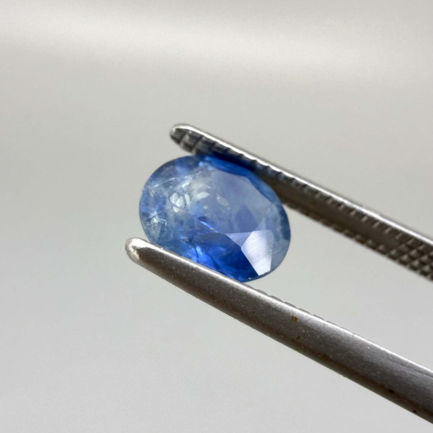 1.18 ct natural rich-blue sapphire from Bangkaja, oval cut.