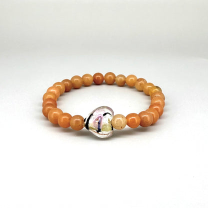 Agate beaded bracelet, 16cm, orange gemstone beads with glass heart focal bead on elastic stretch band.