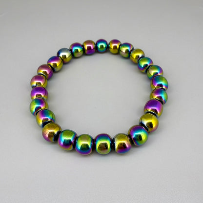 Rainbow hematite beaded bracelet, 18cm, iridescent multicolor gemstone beads on elastic stretch band.