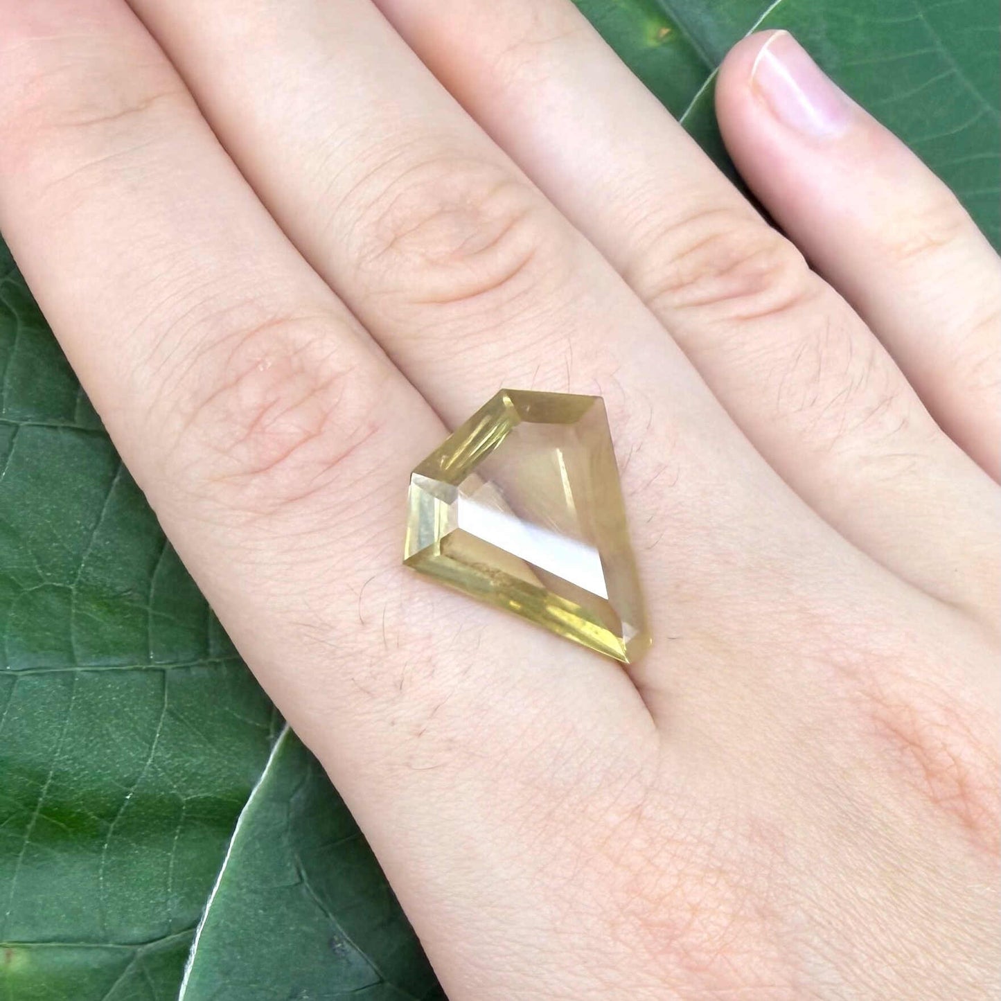 7.87 ct natural lemon quartz, fancy cut, bright yellow color.