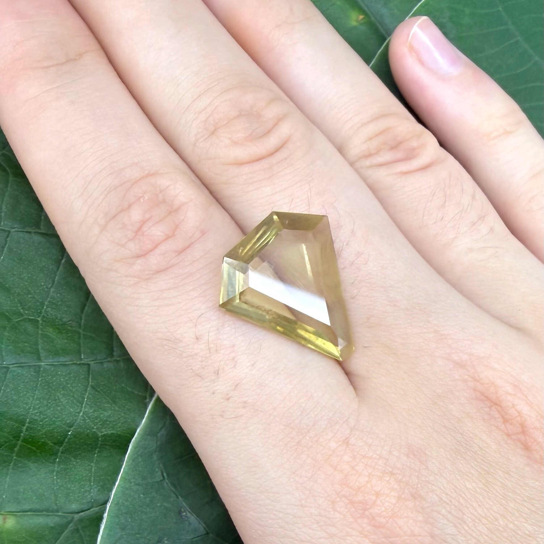 7.87 ct natural lemon quartz, fancy cut, bright yellow color.