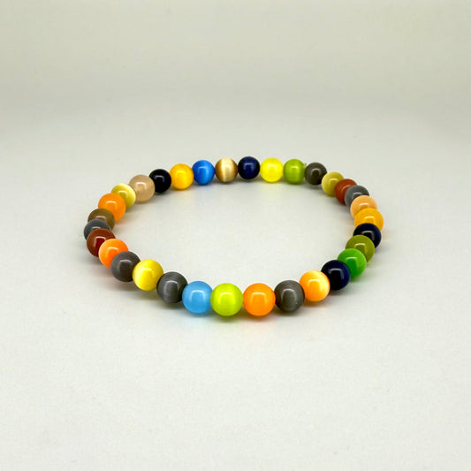 Multicolor cat’s eye beaded bracelet, 18cm, vivid gemstone beads in bright, brown, and black tones with shimmering effect on elastic stretch band.