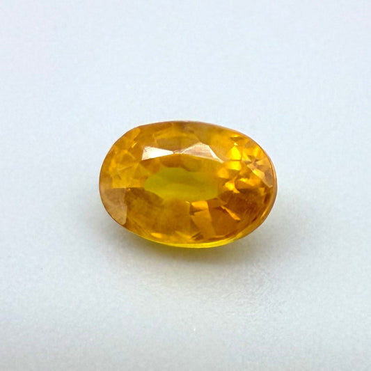 Orange-Yellow Sapphire Oval 0.83 Ct