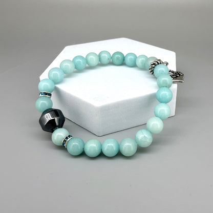 Agate beaded bracelet, 19cm, aqua-blue gemstone beads with decorative medallion accent on elastic stretch band.