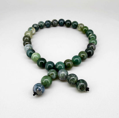 Moss agate mala bracelet made from natural moss agate beads, symbolizing grounding, growth, and connection to nature.