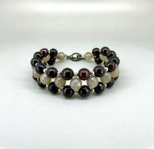 Three-row agate beaded bracelet, 20cm, with deep violet-red outer rows and lighter agate center beads on elastic stretch band.