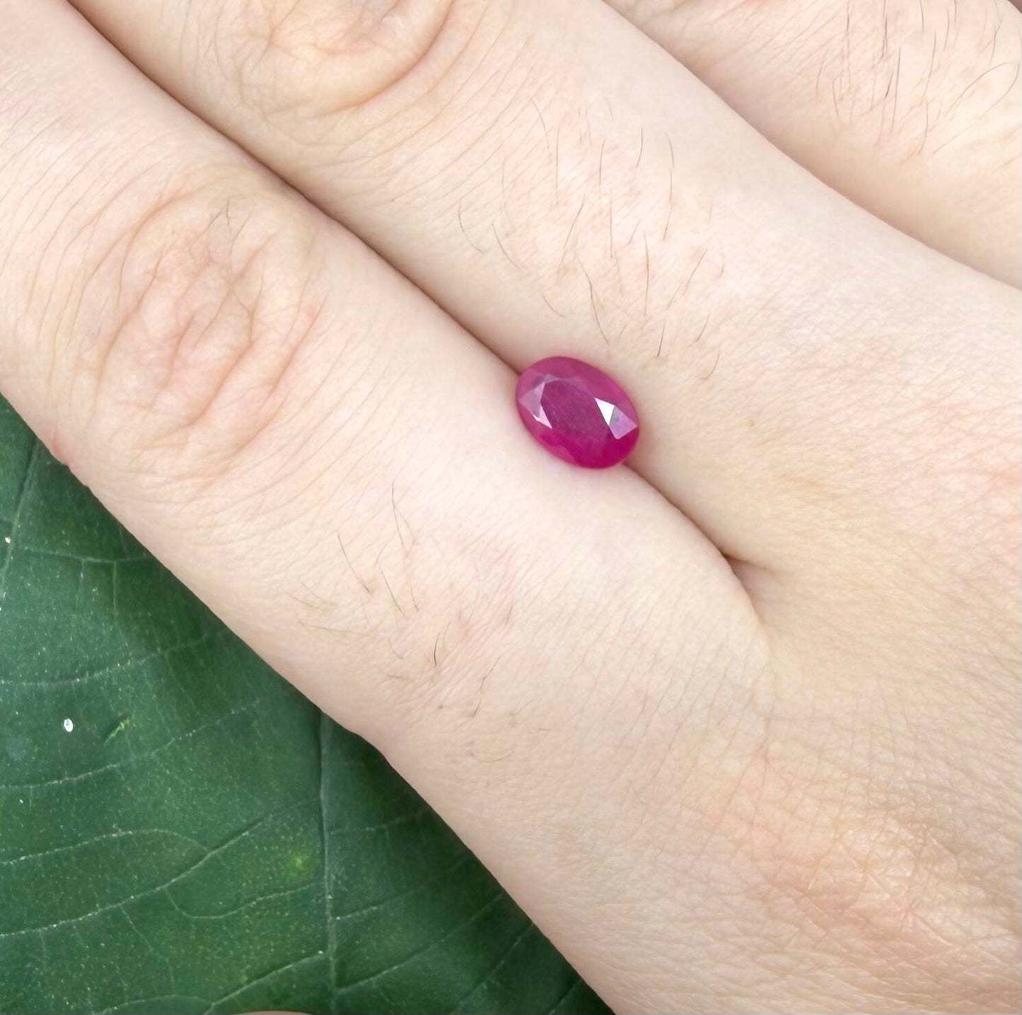 0.87 ct natural pink-red Songea ruby, oval cut.