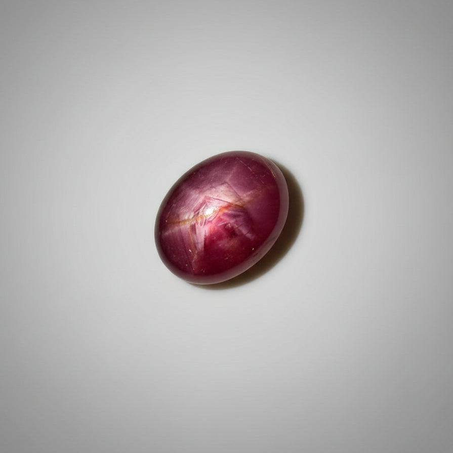 9.61 ct natural Pink-Red Star Ruby cabochon with soft star effect and polished dome