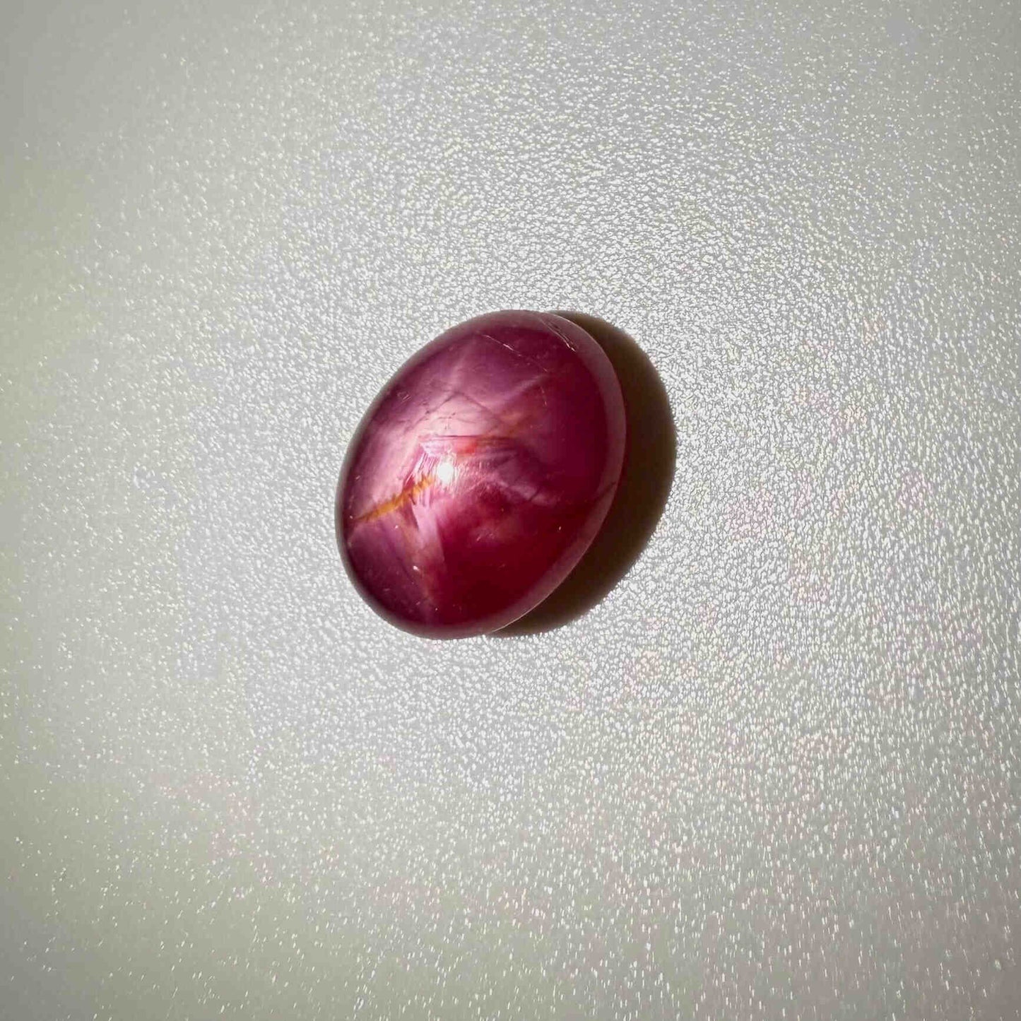 9.61 ct natural Pink-Red Star Ruby cabochon with soft star effect and polished dome
