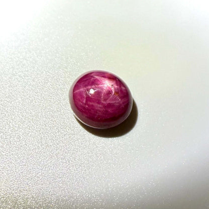 19.1 ct natural Star Ruby cabochon with visible star effect, deep red color and polished dome shape