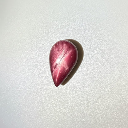 13.8 ct natural pear-shaped Star Ruby medallion cut, polished on both sides with a soft star effect and glossy surface, Mozambique.