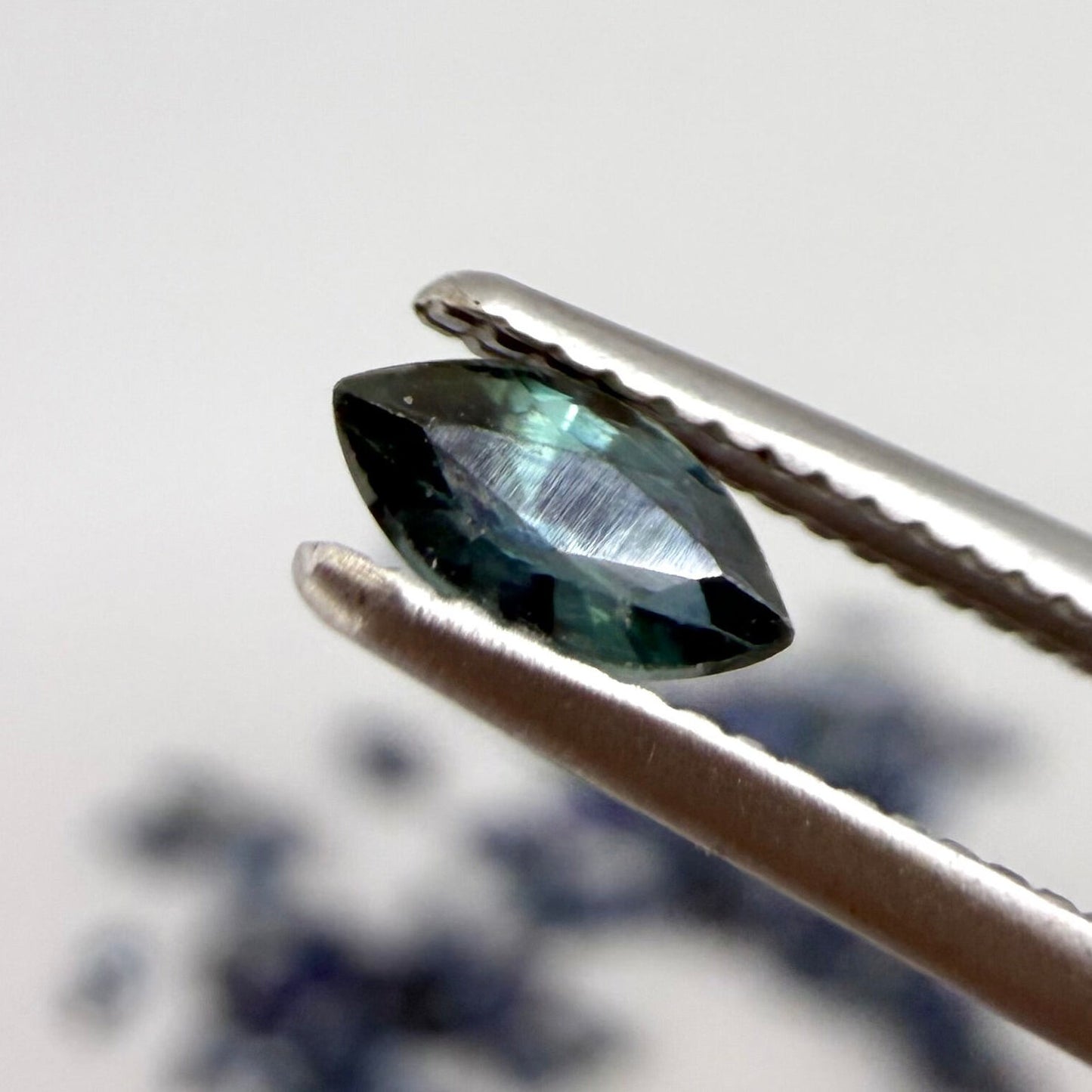 13.2 ct natural sapphire lot from Thailand, marquise cut stones in mid-to-dark vibrant blue hues.