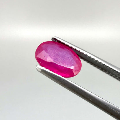 0.87 ct natural pink-red Songea ruby, oval cut.