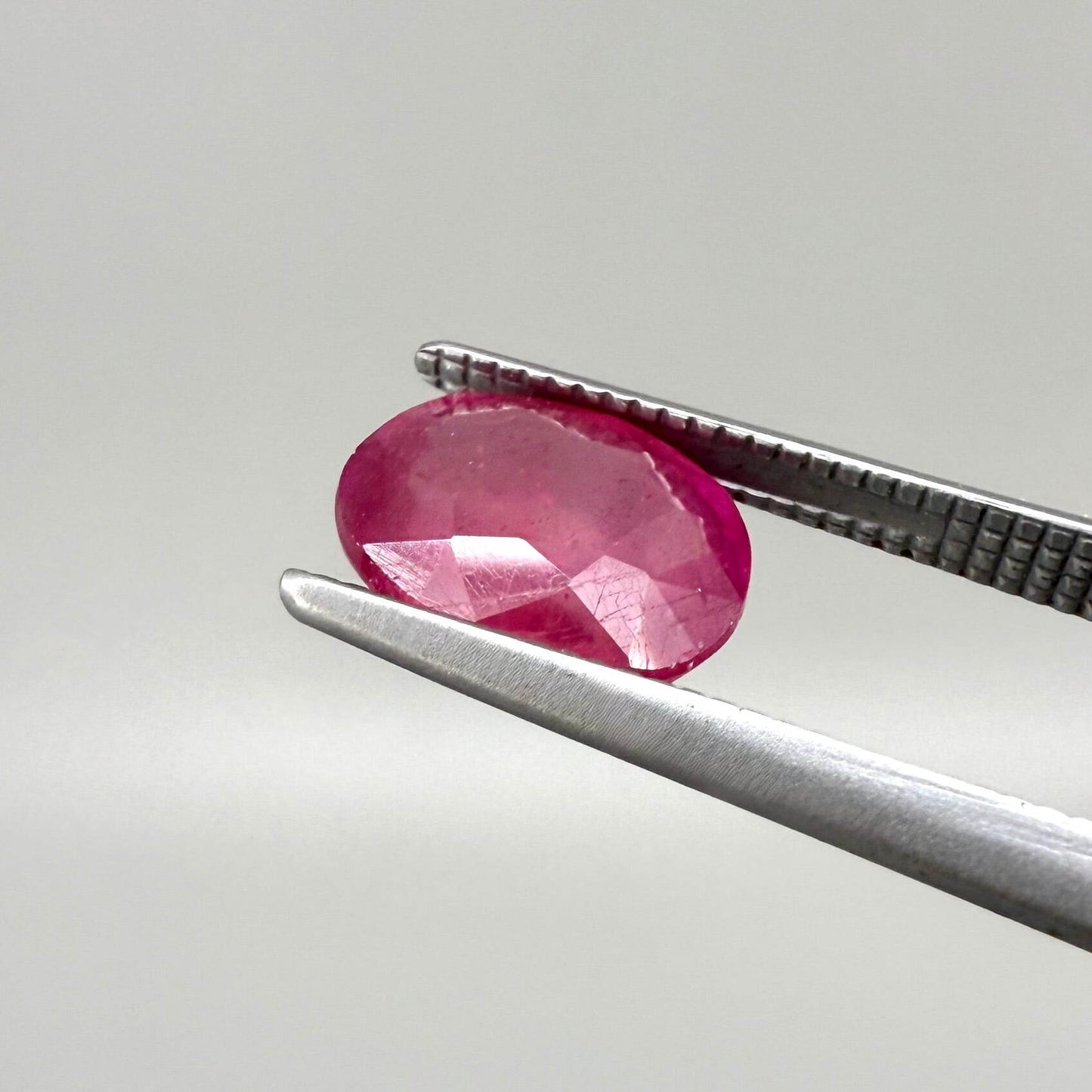 2.2 ct natural pink-red Mozambique ruby, oval cut.