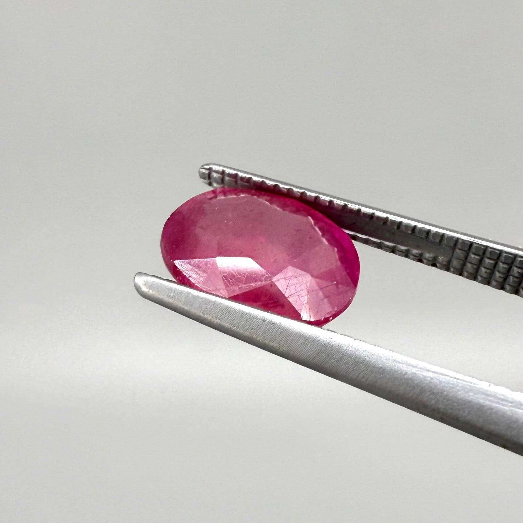 2.2 ct natural pink-red Mozambique ruby, oval cut.