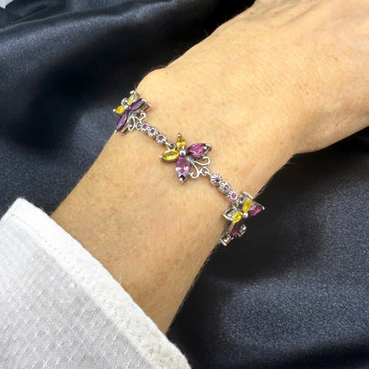 Gem Butterfly bracelet with rhodolite, sapphire and ruby gemstones set in white gold plated silver