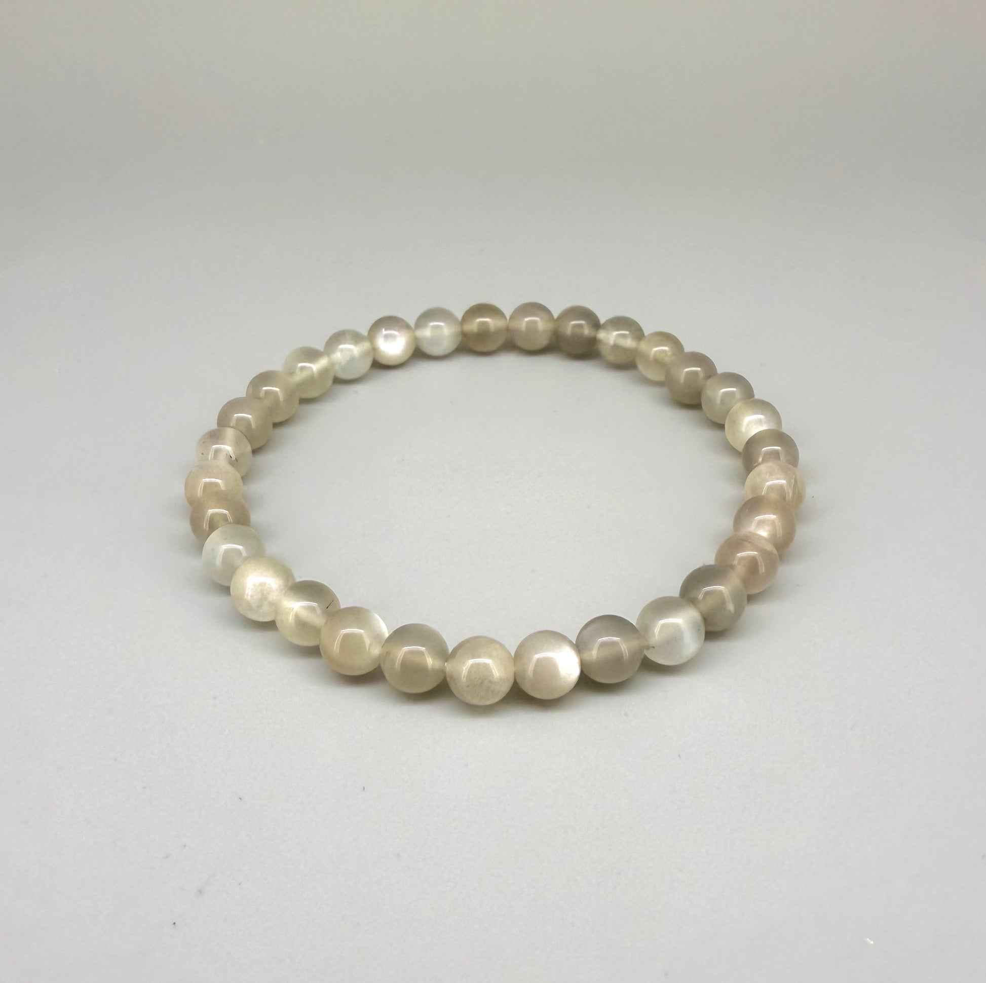 Moonstone beaded bracelet, 20cm, natural beige and earthy gemstone beads with subtle shimmer on elastic stretch band.