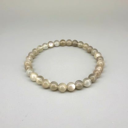 Moonstone beaded bracelet, 20cm, natural beige and earthy gemstone beads with subtle shimmer on elastic stretch band.