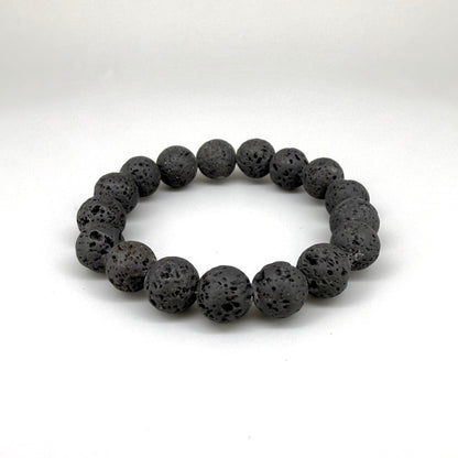 Lava beaded bracelet, 16cm, natural matte black porous gemstone beads on elastic stretch band.