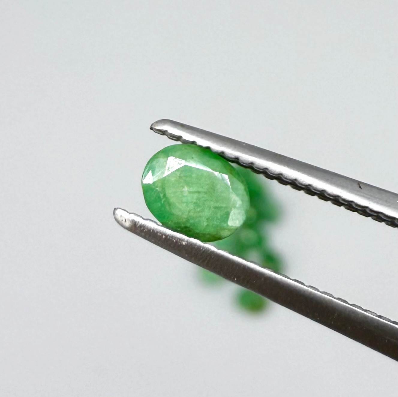 2.3 ct natural emerald lot from Zambia, oval stones 