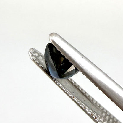 0.35 ct natural dark-blue sapphire from Bangkaja, pear cut.