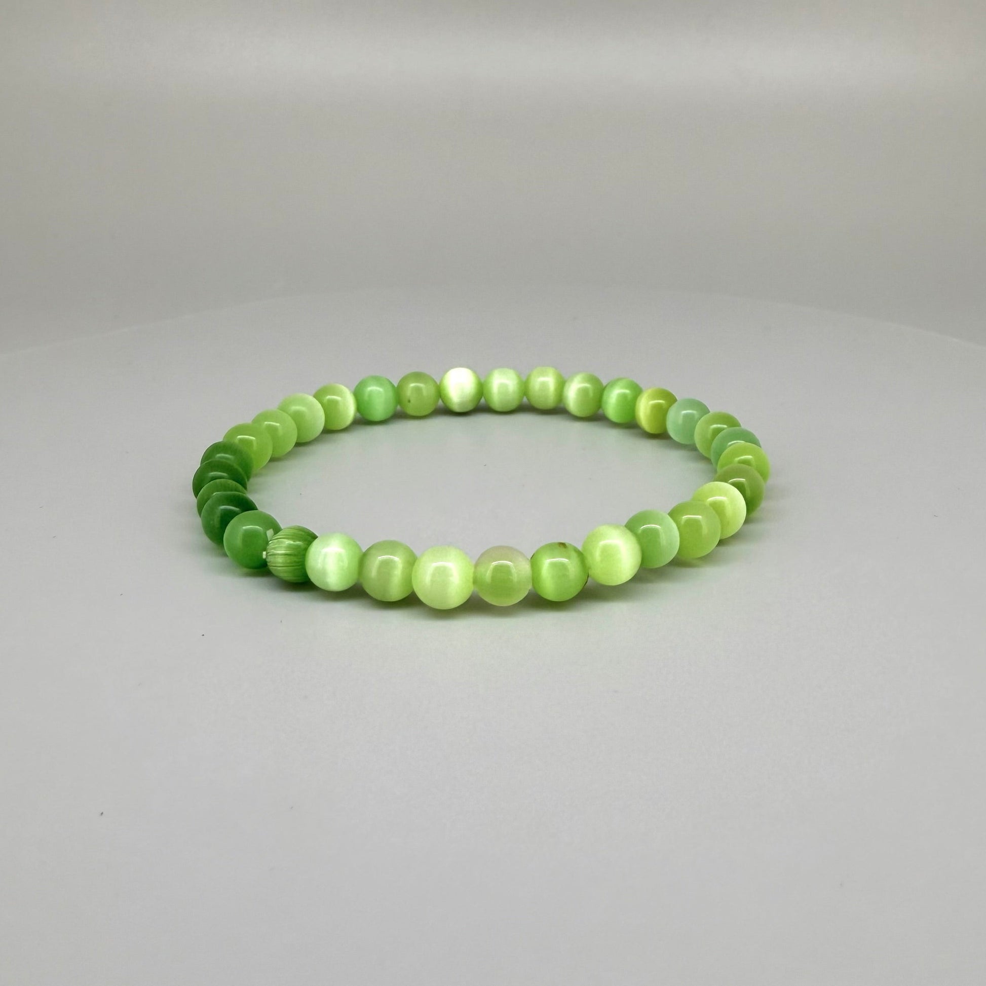 Cat’s Eye beaded bracelet, 18cm, natural shimmering grey gemstone beads on elastic stretch band.