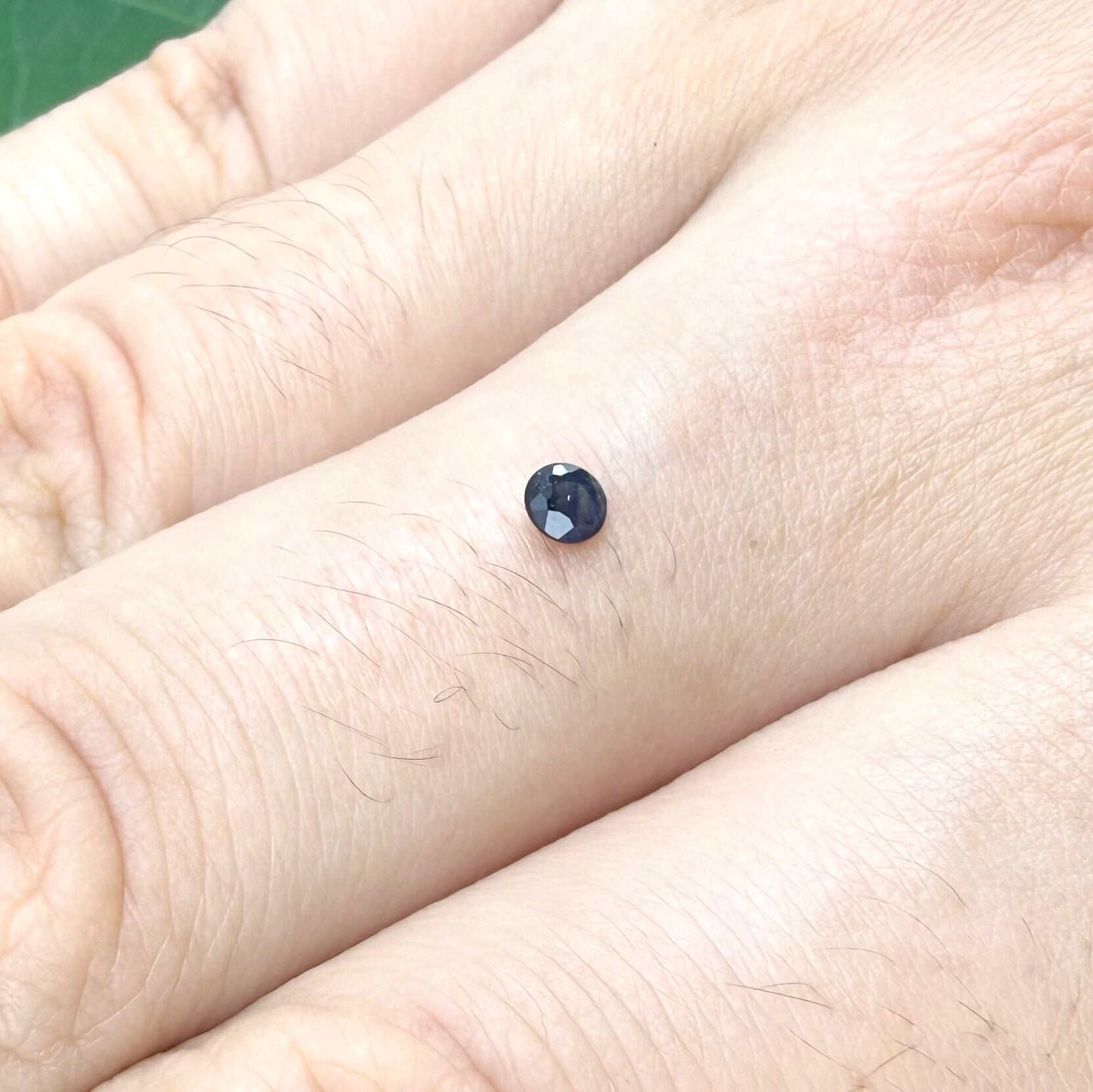 0.14 ct natural Pailin sapphire from Cambodia, oval cut.