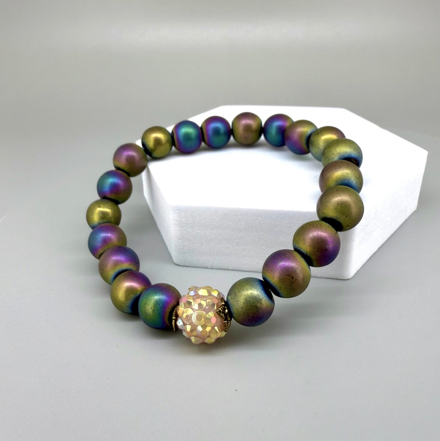 Hematite beaded bracelet, 18cm, natural metallic rainbow gemstone beads on elastic stretch band.