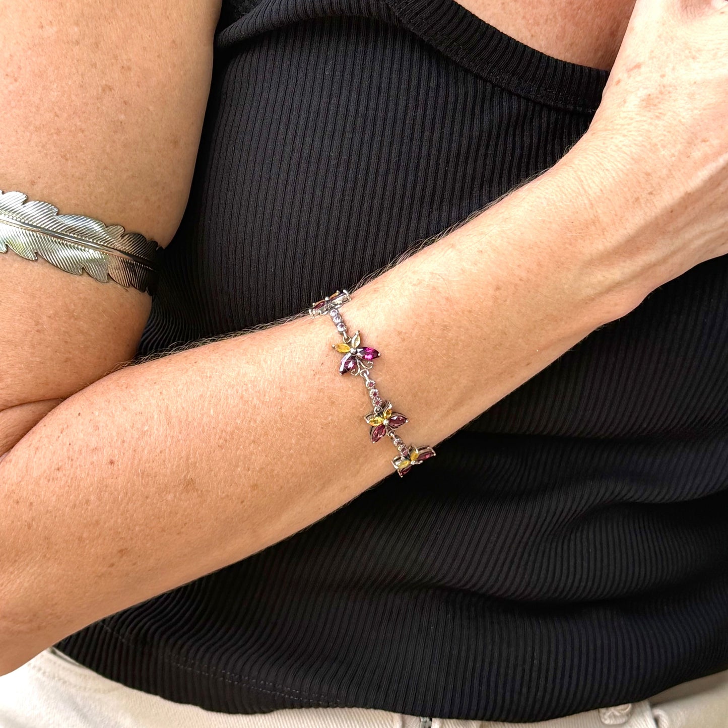 Gem Butterfly bracelet with rhodolite, sapphire and ruby gemstones set in white gold plated silver
