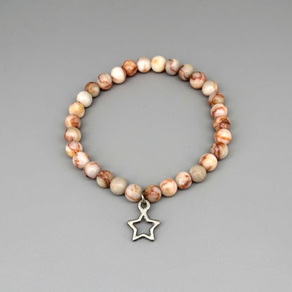 Orange-beige jasper beaded bracelet, 17cm, natural gemstone beads with star charm on elastic stretch band.
