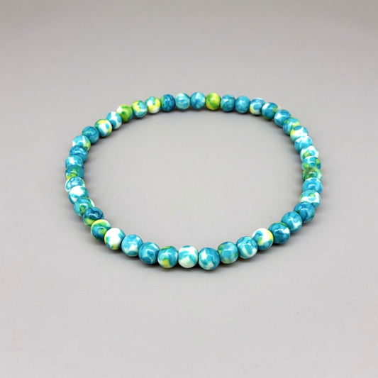 Jade beaded bracelet, 18cm, gemstone beads in turquoise, yellow, and white tones on elastic stretch band.