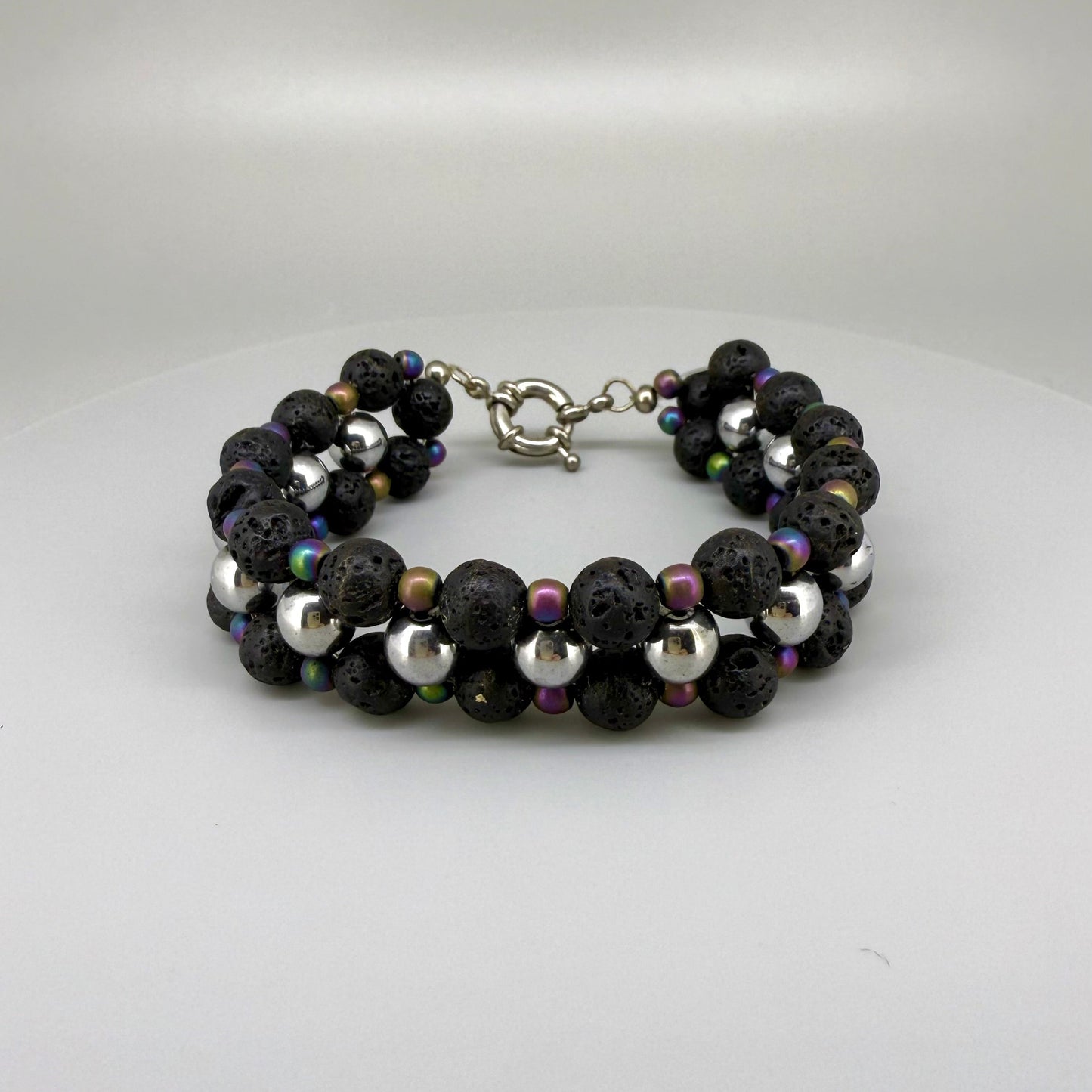 Lava and hematite beaded bracelet, natural matte black and metallic grey gemstone beads with spring ring clasp.