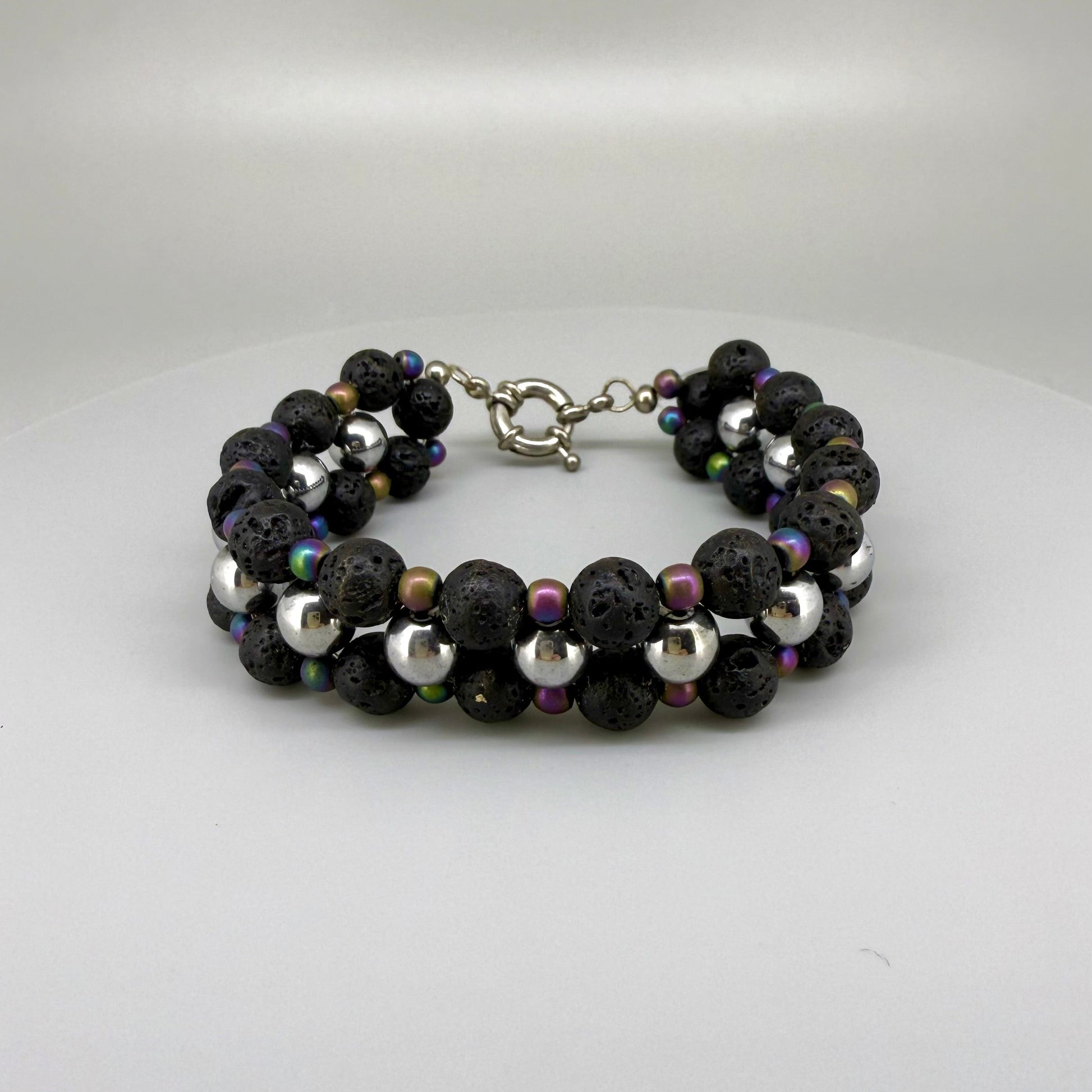 Lava and hematite beaded bracelet, natural matte black and metallic grey gemstone beads with spring ring clasp.