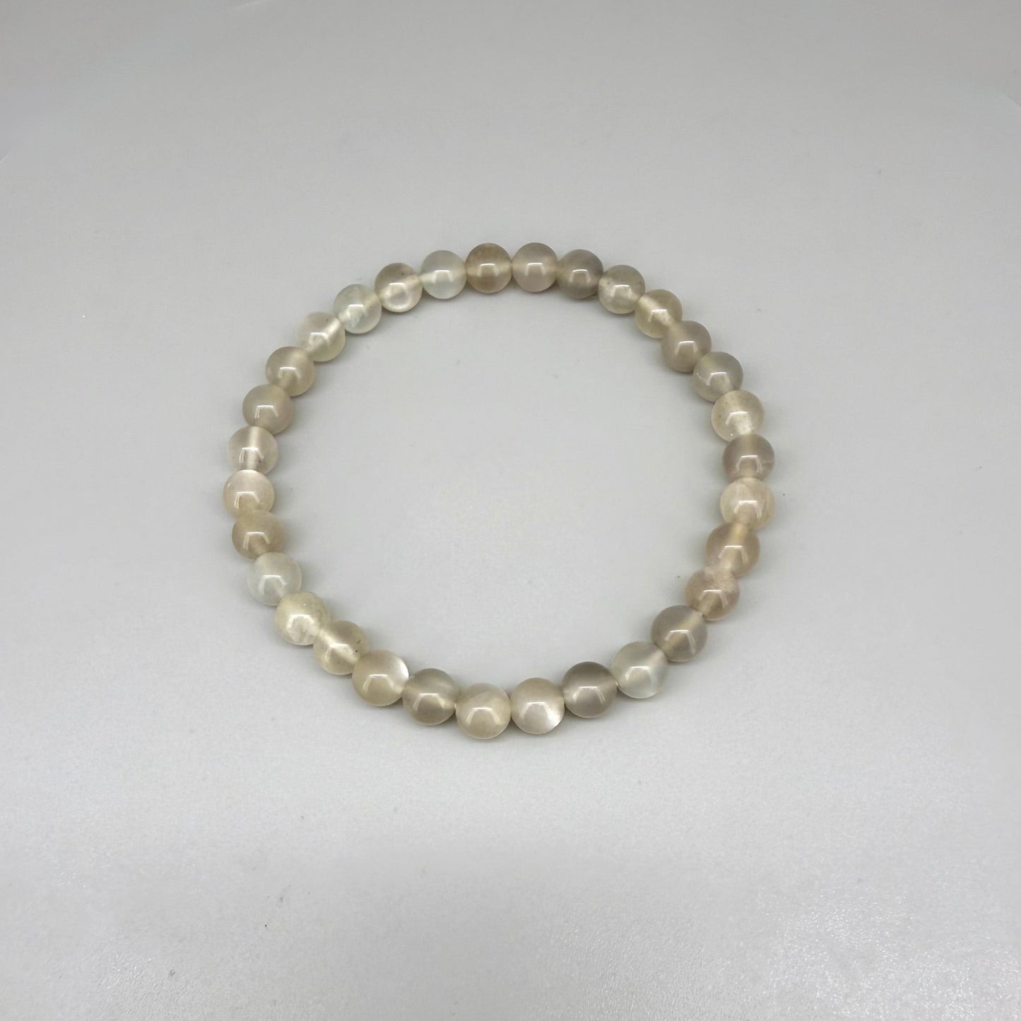 Moonstone beaded bracelet, 20cm, natural beige and earthy gemstone beads with subtle shimmer on elastic stretch band.