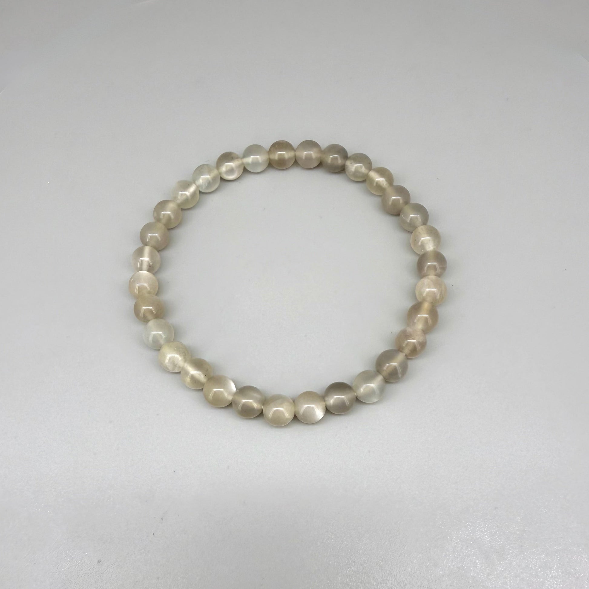 Moonstone beaded bracelet, 20cm, natural beige and earthy gemstone beads with subtle shimmer on elastic stretch band.