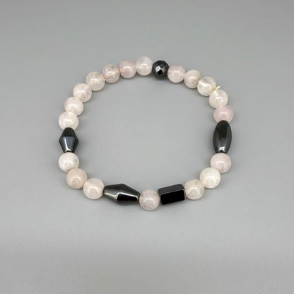 Rose quartz and hematite beaded bracelet, 18cm, soft pink gemstone beads with metallic hematite spacers on elastic stretch band.