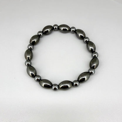 Hematite beaded bracelet, 19cm, dark metallic grey magnetic gemstone beads on elastic stretch band.