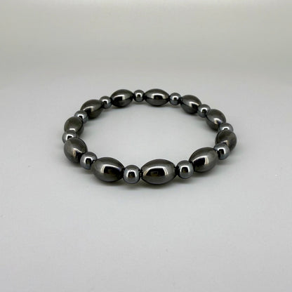 Hematite beaded bracelet, 19cm, dark metallic grey magnetic gemstone beads on elastic stretch band.
