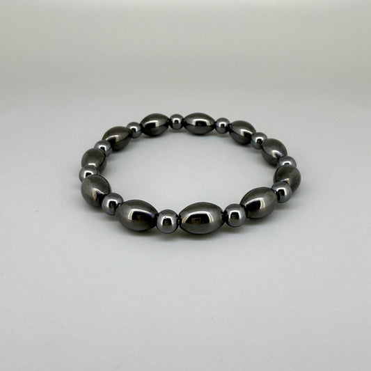 Hematite beaded bracelet, 19cm, dark metallic grey magnetic gemstone beads on elastic stretch band.