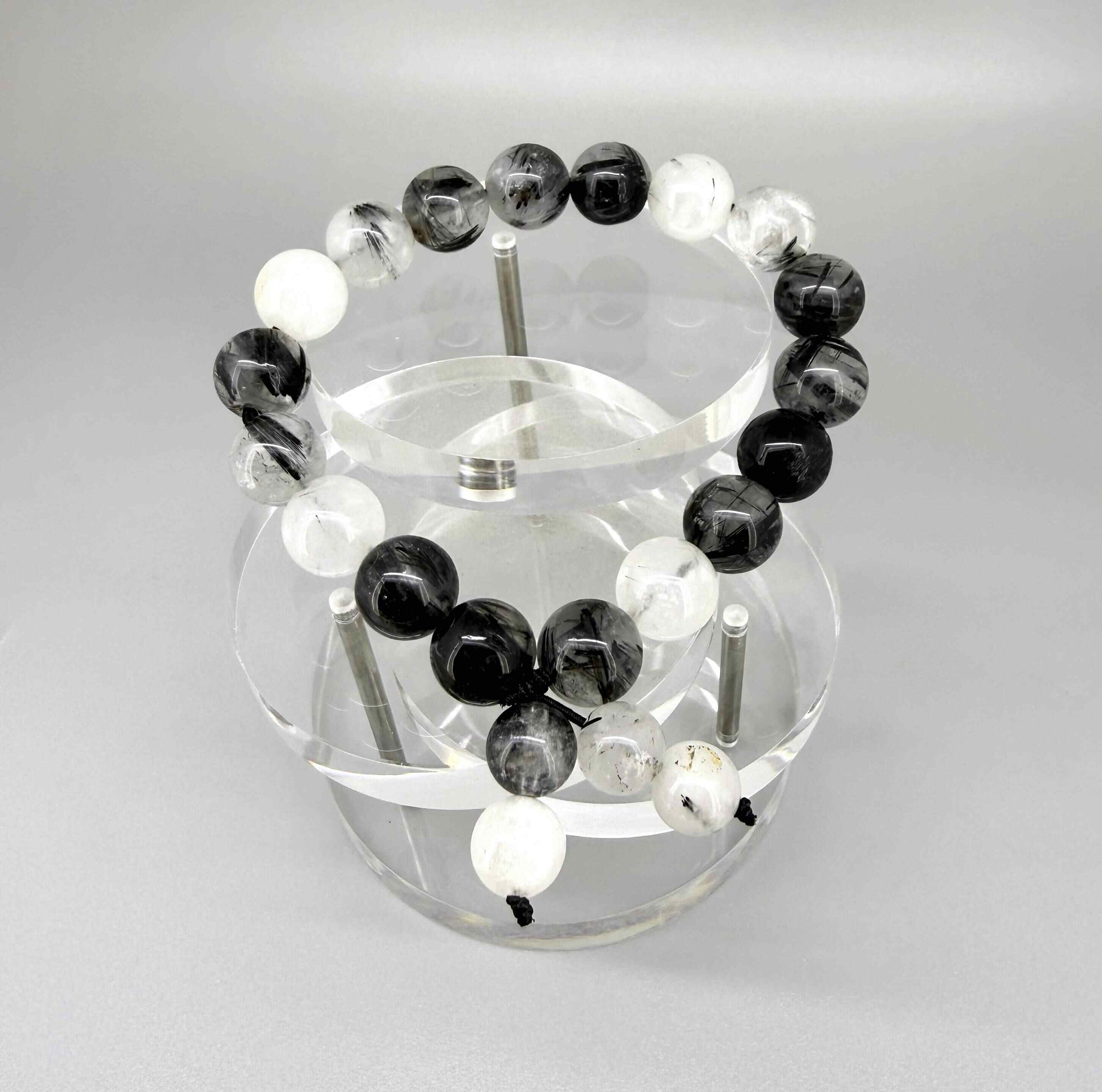 Rutilated quartz mala bracelet made from natural rutilated quartz beads, symbolizing clarity, focus, and inner direction.
