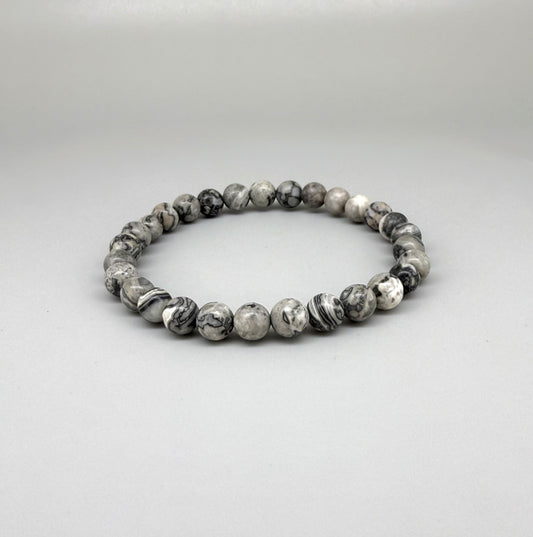 Jasper beaded bracelet, natural grey, black, and white marbled gemstone beads on elastic stretch band.