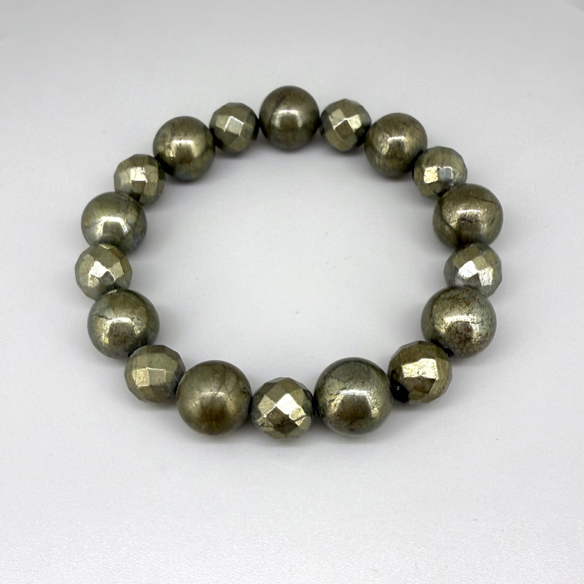 Pyrite beaded bracelet, 20cm, metallic golden-grey gemstone beads on elastic stretch band.