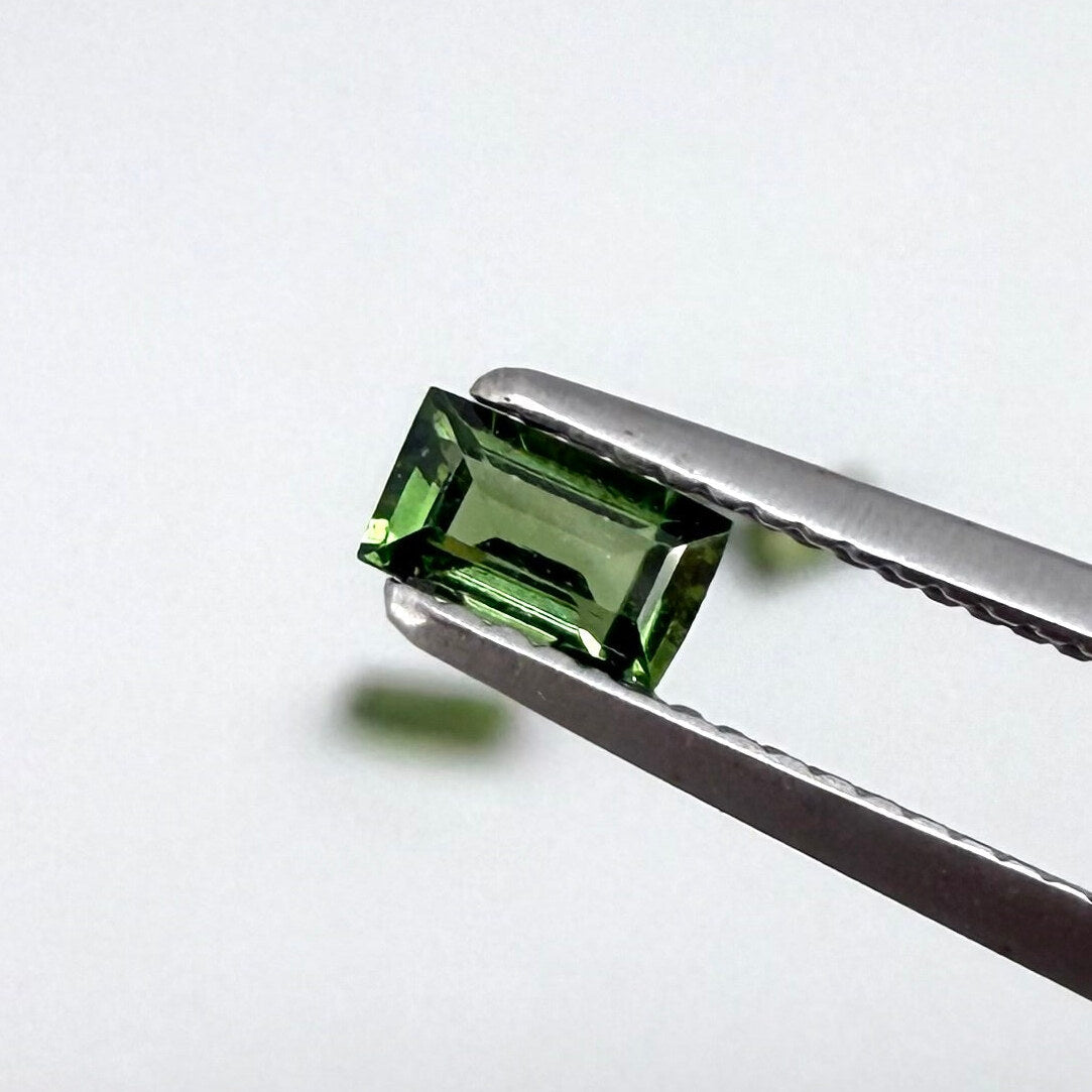 1.06 ct natural green sapphire lot from Thailand, baguette cut stones.